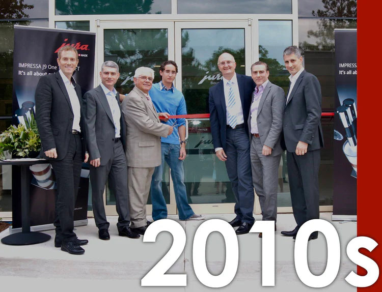 The ribbon-cutting ceremony at the opening of the Jura Hospitality Centre in Mississauga in 2011